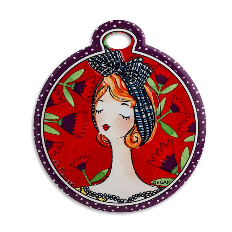 Set Grembiule in cotone stampato, Sottopentola e Poggiamestolo in ceramica smaltata Rosso "LE PUPAZZE" Egan