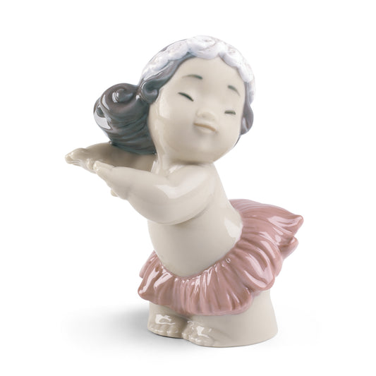 Scultura in porcellana spagnola "ONDEGGIARE HAWAIANO" Nao By Lladrò